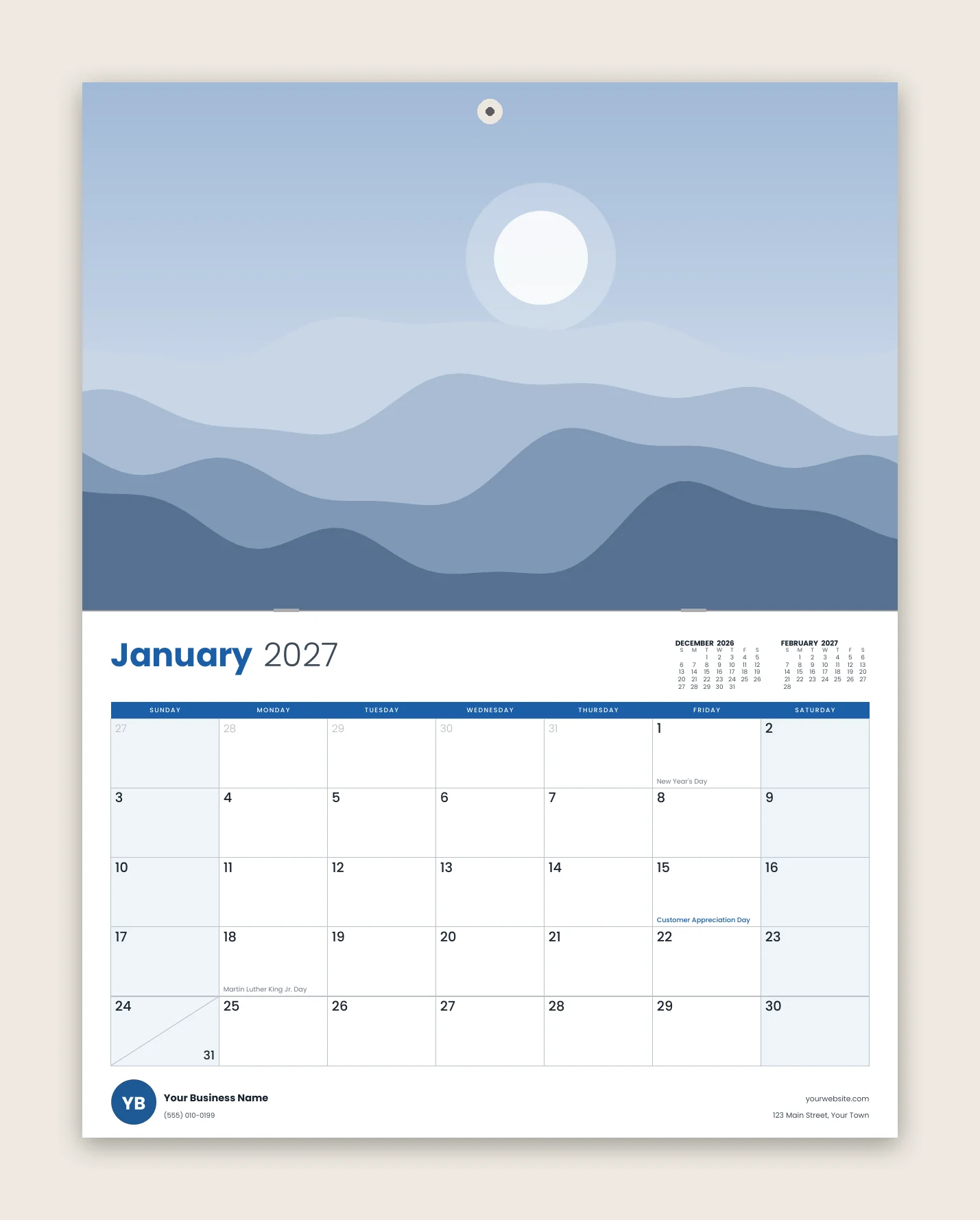 Preview of the mini wall calendar hanging open on January 2027, with the photo above the month grid and a business footer below
